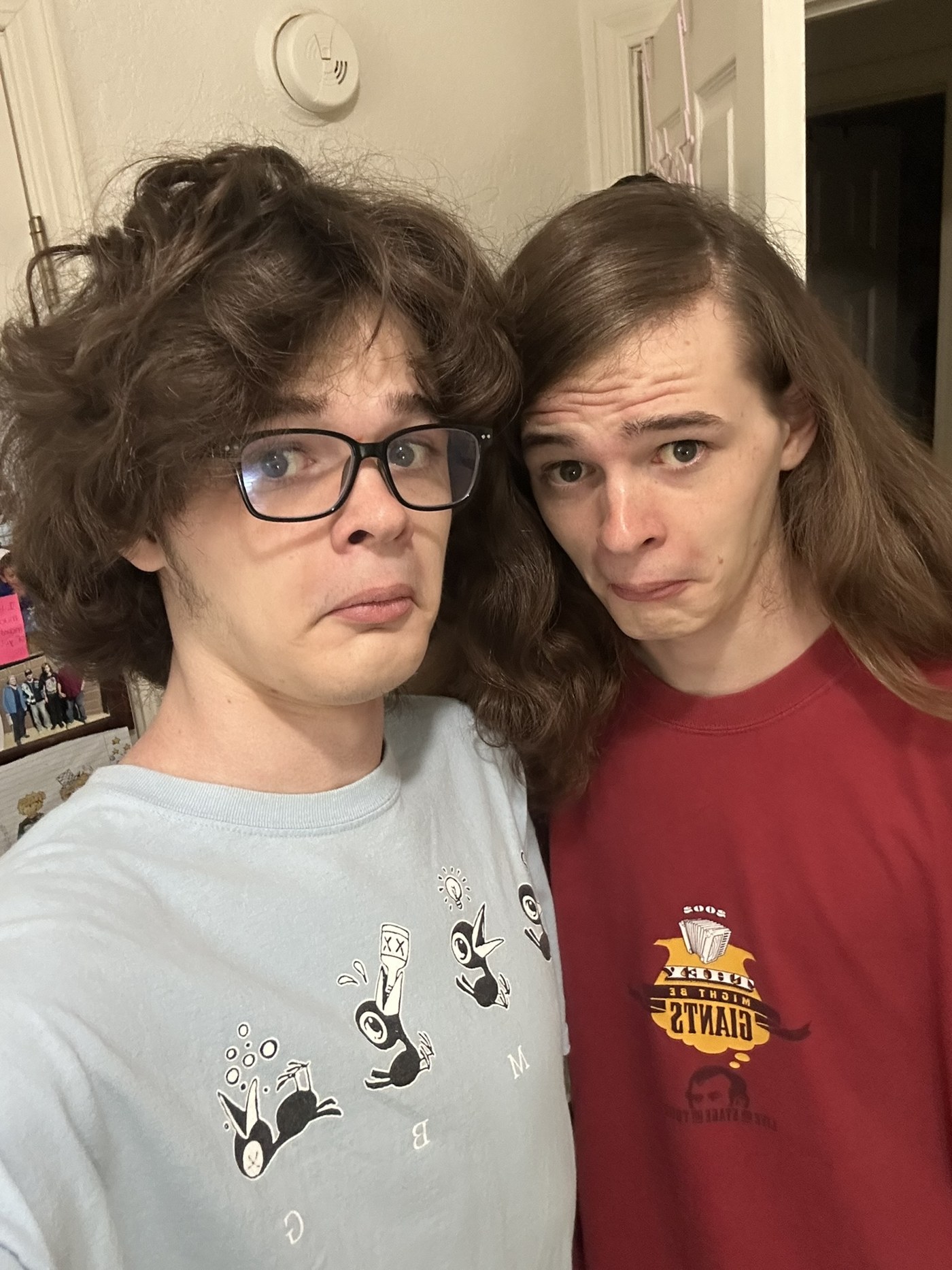 Mitch (left) and Hayden (right) standing together making a funny face